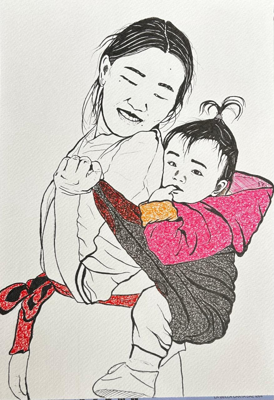 Ink portrait of a smiling woman carrying a toddler in a grey cloth wrap knotted with a red sash, the child in a pink hooded jacket resting against her side.